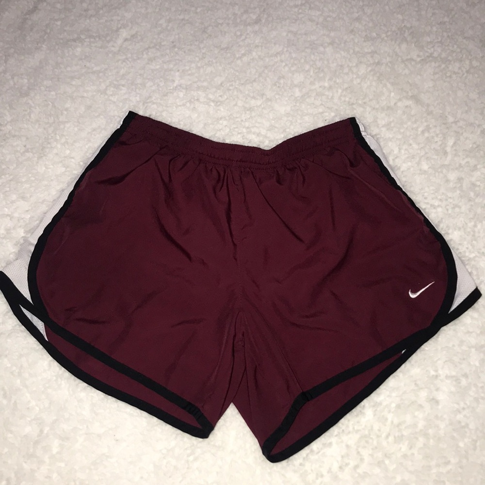 Red Nike shorts